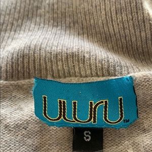 A short sleeve cashmere sweater. Sexy and Sassy